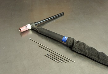 Pre sharpened electrodes and tungsten on a welding bench